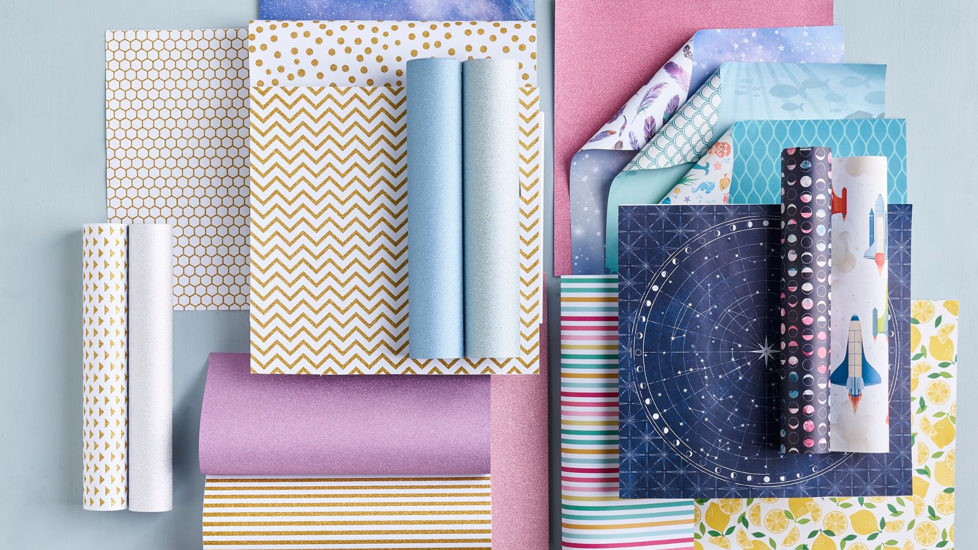 Assorted printed, glitter and special patterned papers