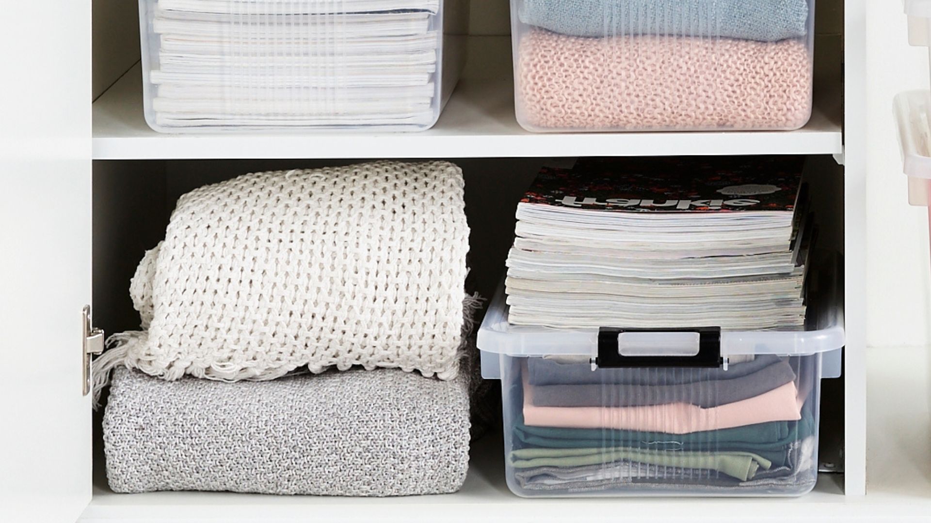 Separate your linen with shelving units in your storage cupboard