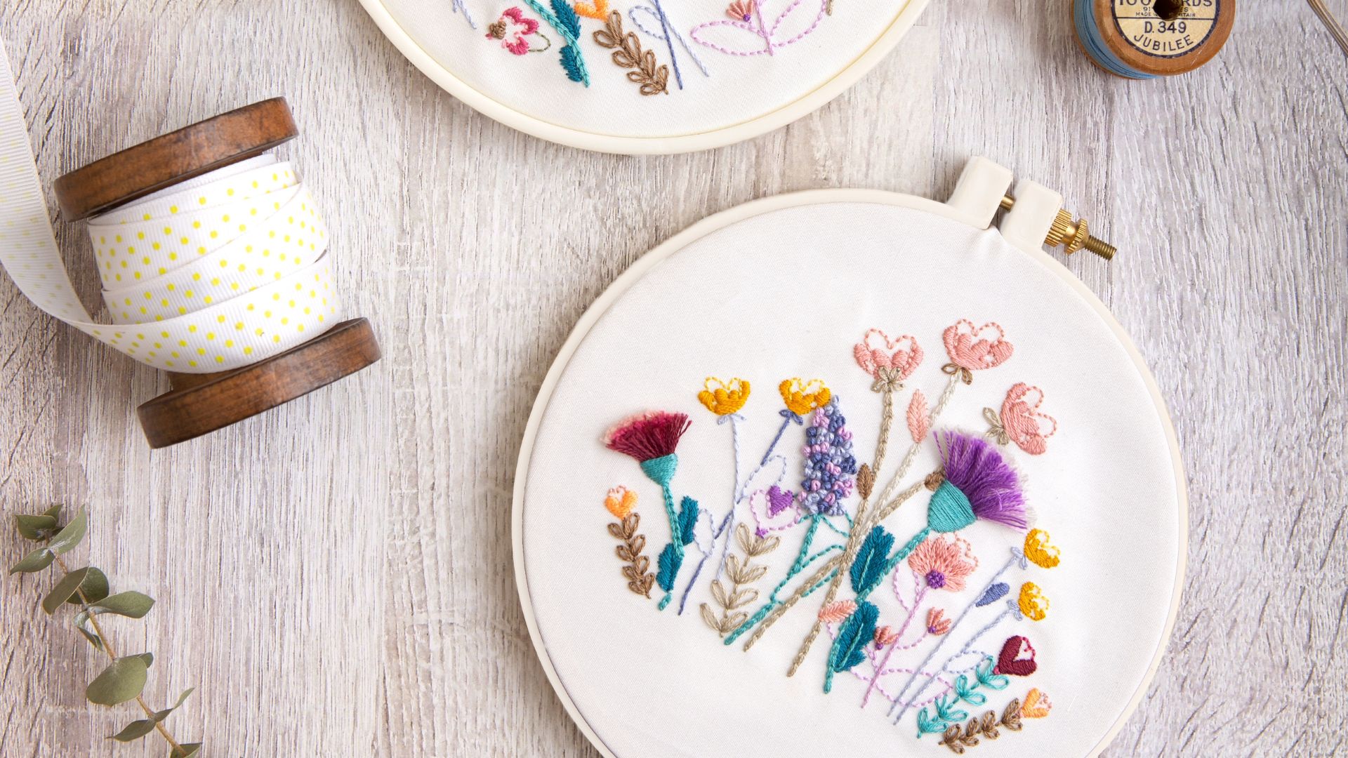 Hand embroidered floral hoop artwork