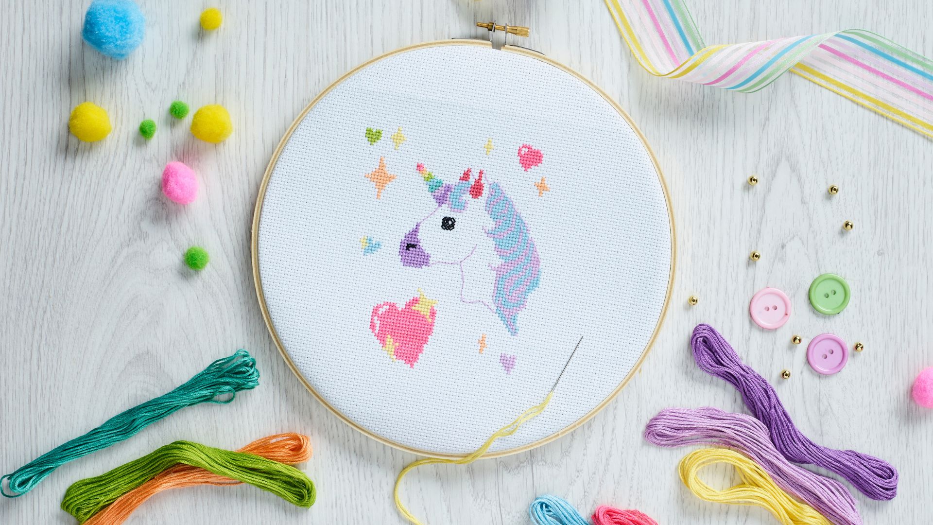 Cross-stitch your own pastel unicorn framed art
