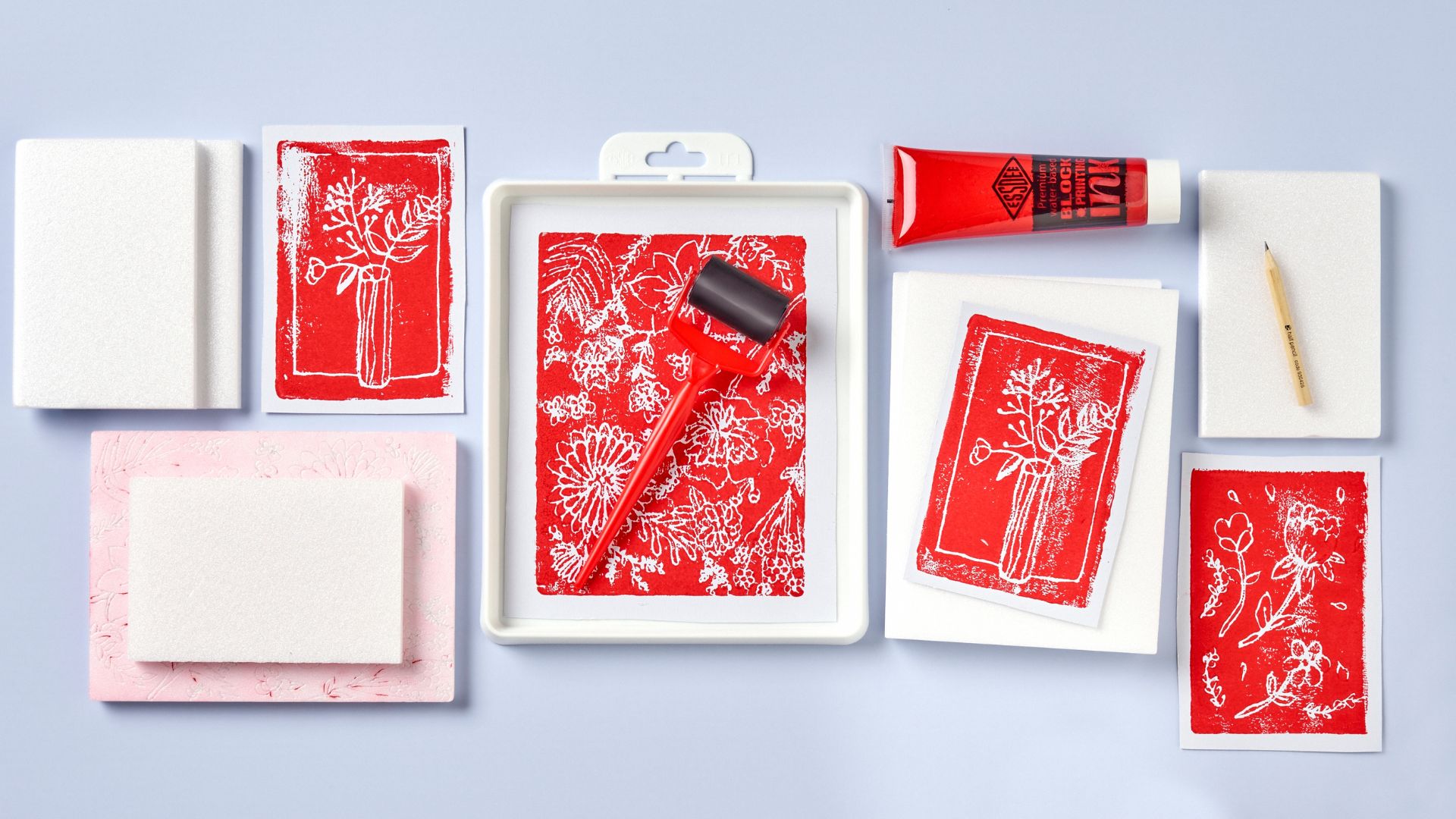 Lino printing station with red Essoee Block Printing Ink & Rubber Roller