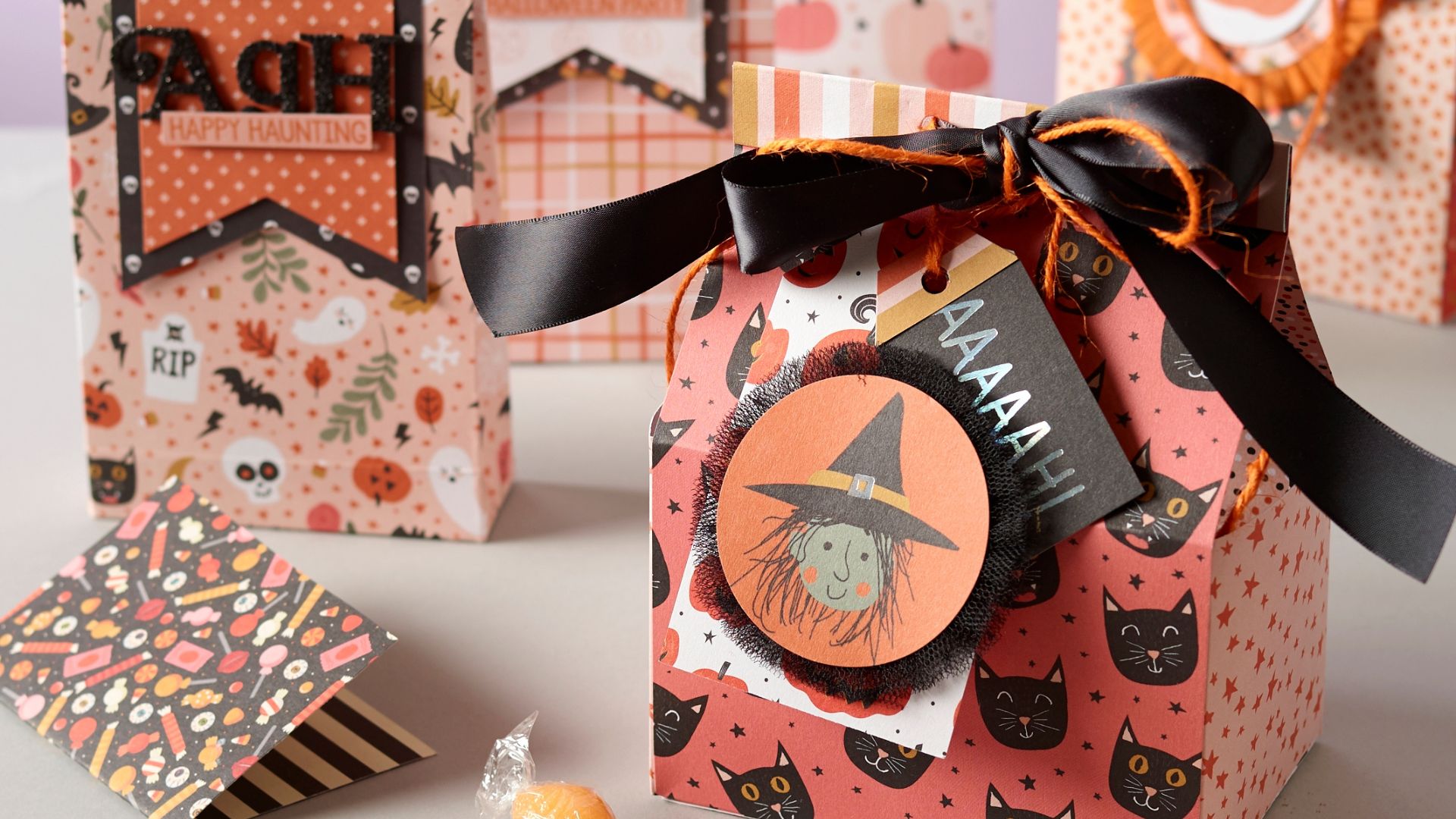 Put together Halloween treat bags & boxes to trick-or-treat